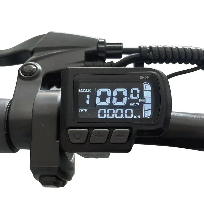 Digital display on a bicycle handlebar with gear and speed information.