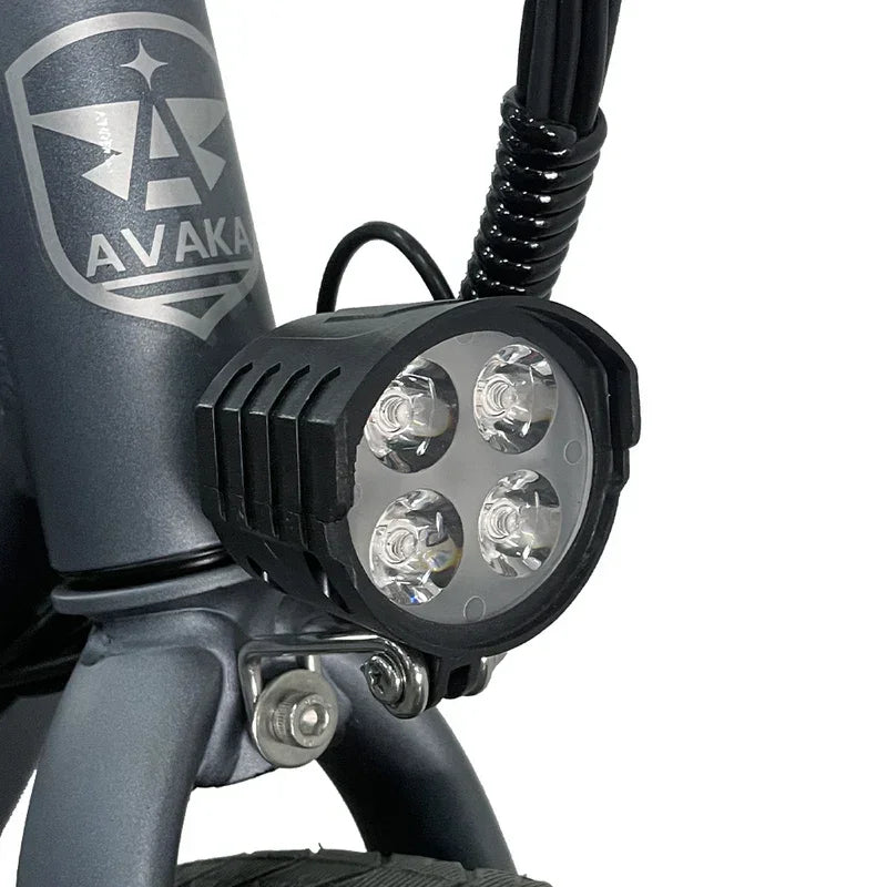 Bicycle light with Avaka branding on a white background