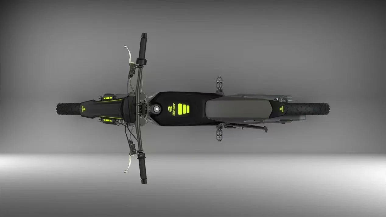 Top view of a black electric scooter on a gray background